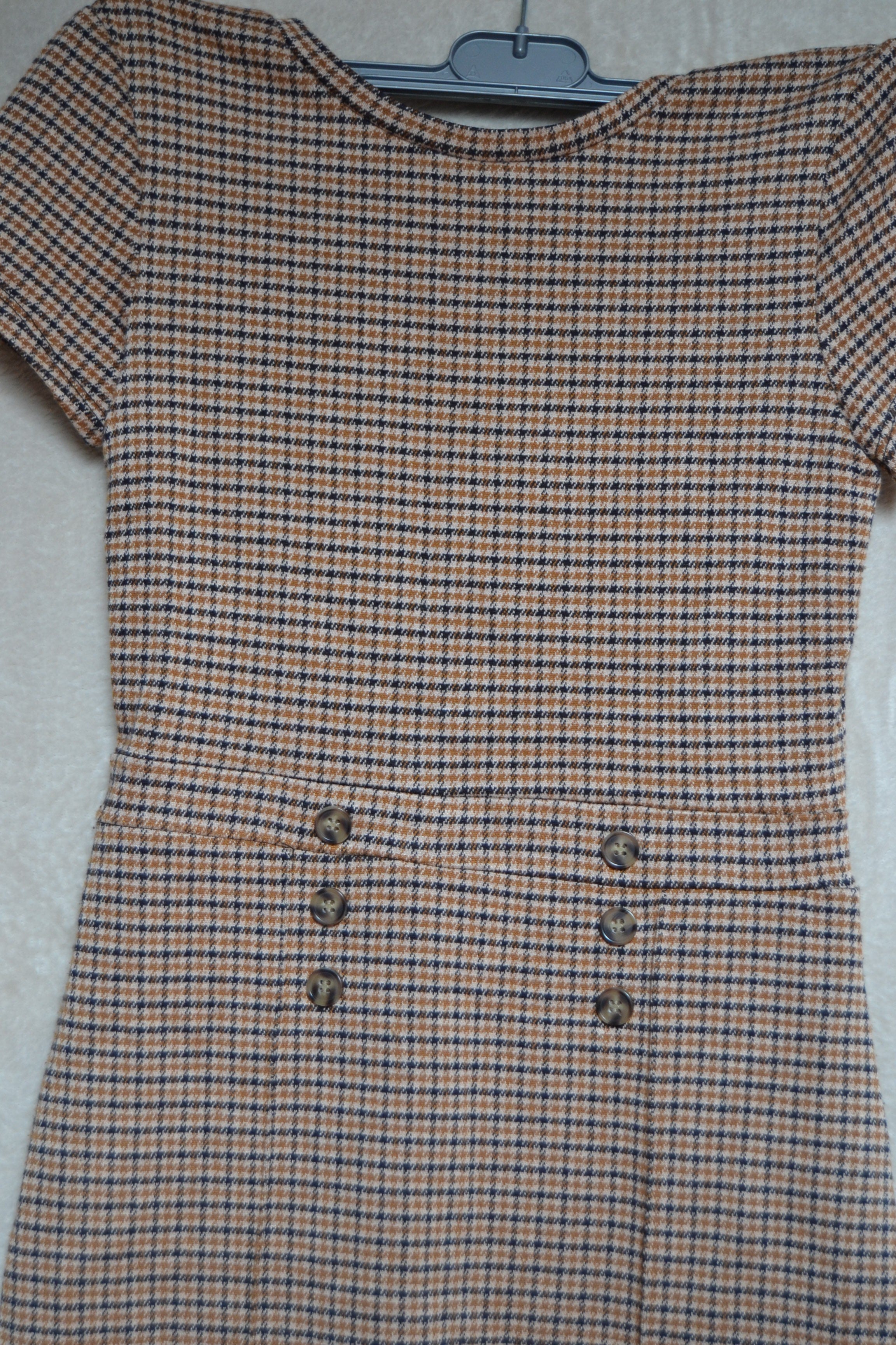Robe a carreaux Taille 10ans